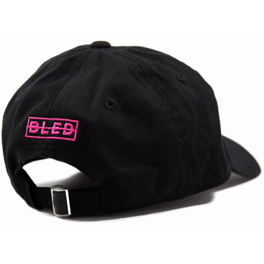 6-panel unconstructed 100% Cotton black dad hat featuring BLEDBOY design on front and pink Bled logo on the back with adjustable strap closure. Pluto Cartoon