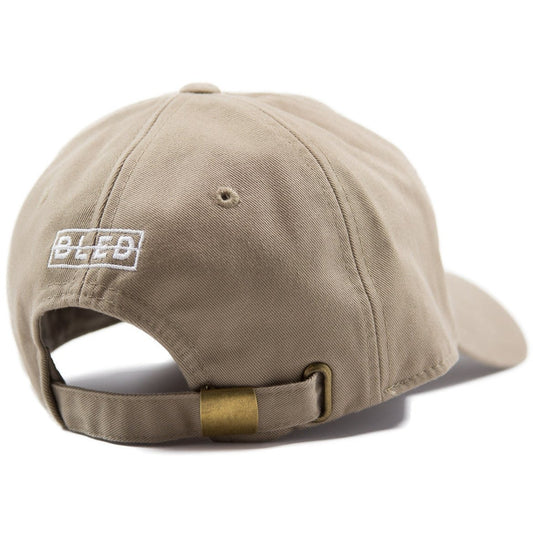 6-panel unconstructed Cotton tan beige dad hat featuring BLED letter logo felt patch on the front and BLED logo embroidered on the back with adjustable strap closure. skate, skateboarding, hype, streetwear