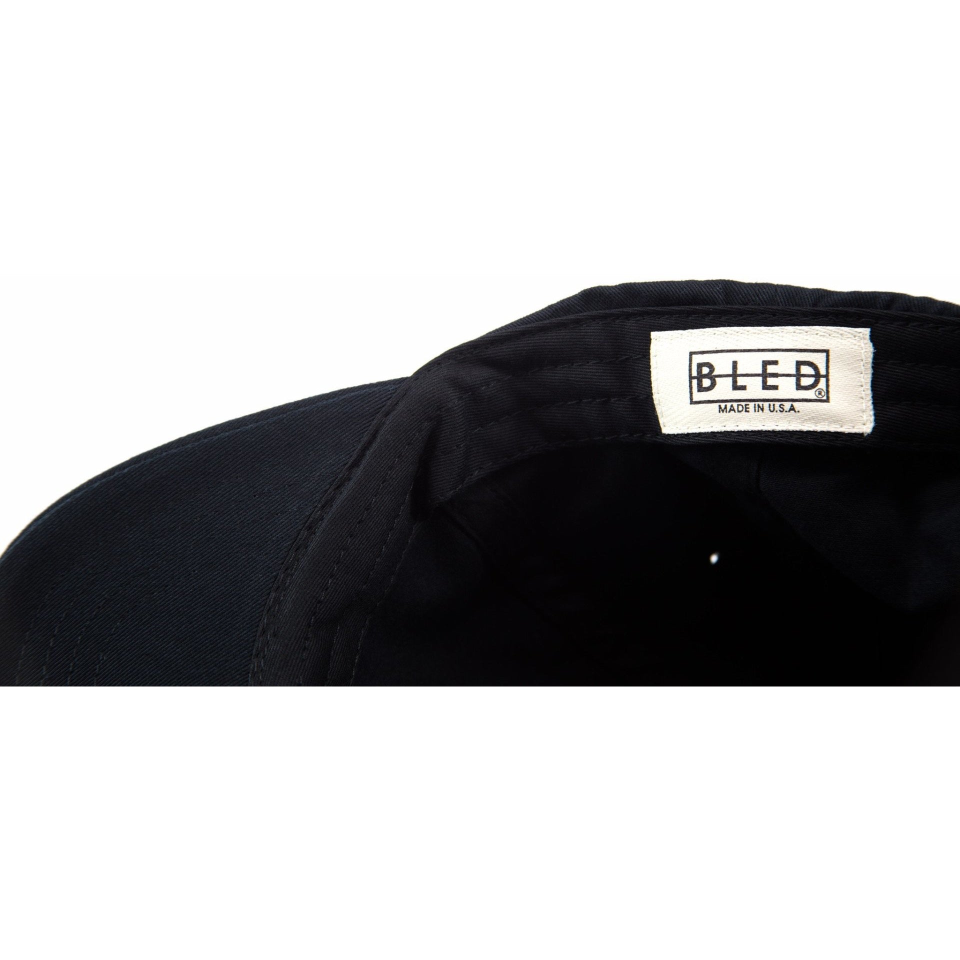 6-panel unconstructed 100% Cotton black dad hat featuring Levels design embroidery on the front and Bled logo embroidered on the back with adjustable strap closure.